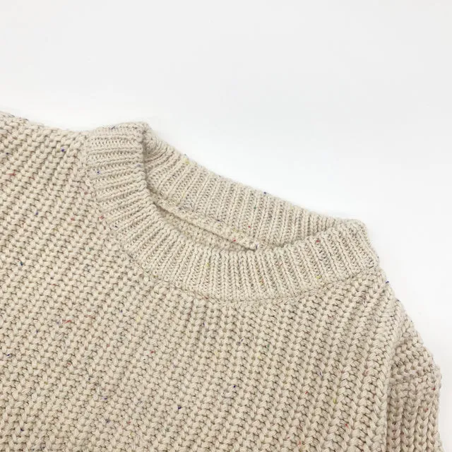Children winter cotton oversized sweatersuit top in vanilla colour, laid flat showing front design for babies and toddlers