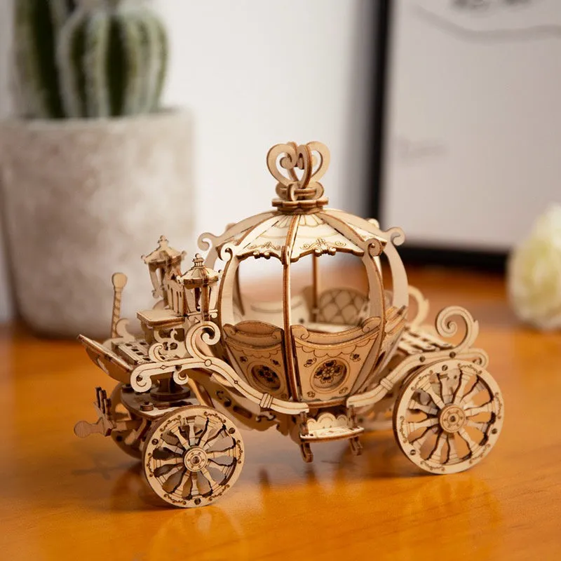 Wooden 3D puzzle model of a balloon assembled from pre-cut wood pieces on a light background