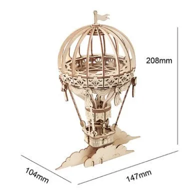 Wooden 3D puzzle model of a balloon assembled from pre-cut wood pieces on a light background