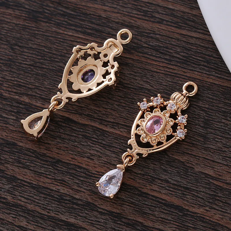 Small water drop-shaped pendant with a zircon crown charm in five colour choices