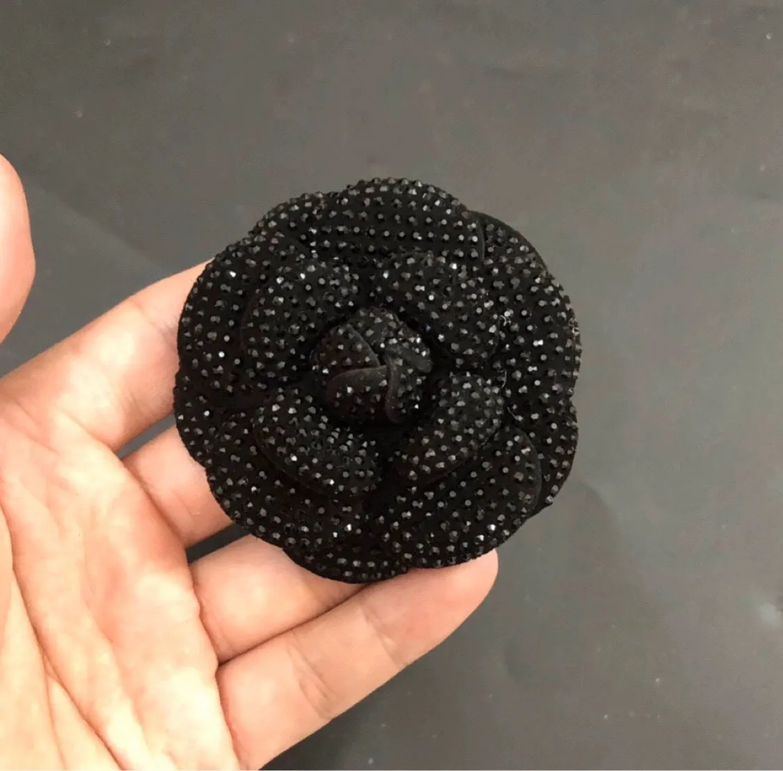 Genuine leather shoe ornament brooch with chain and star design in various colour and crystal combinations.