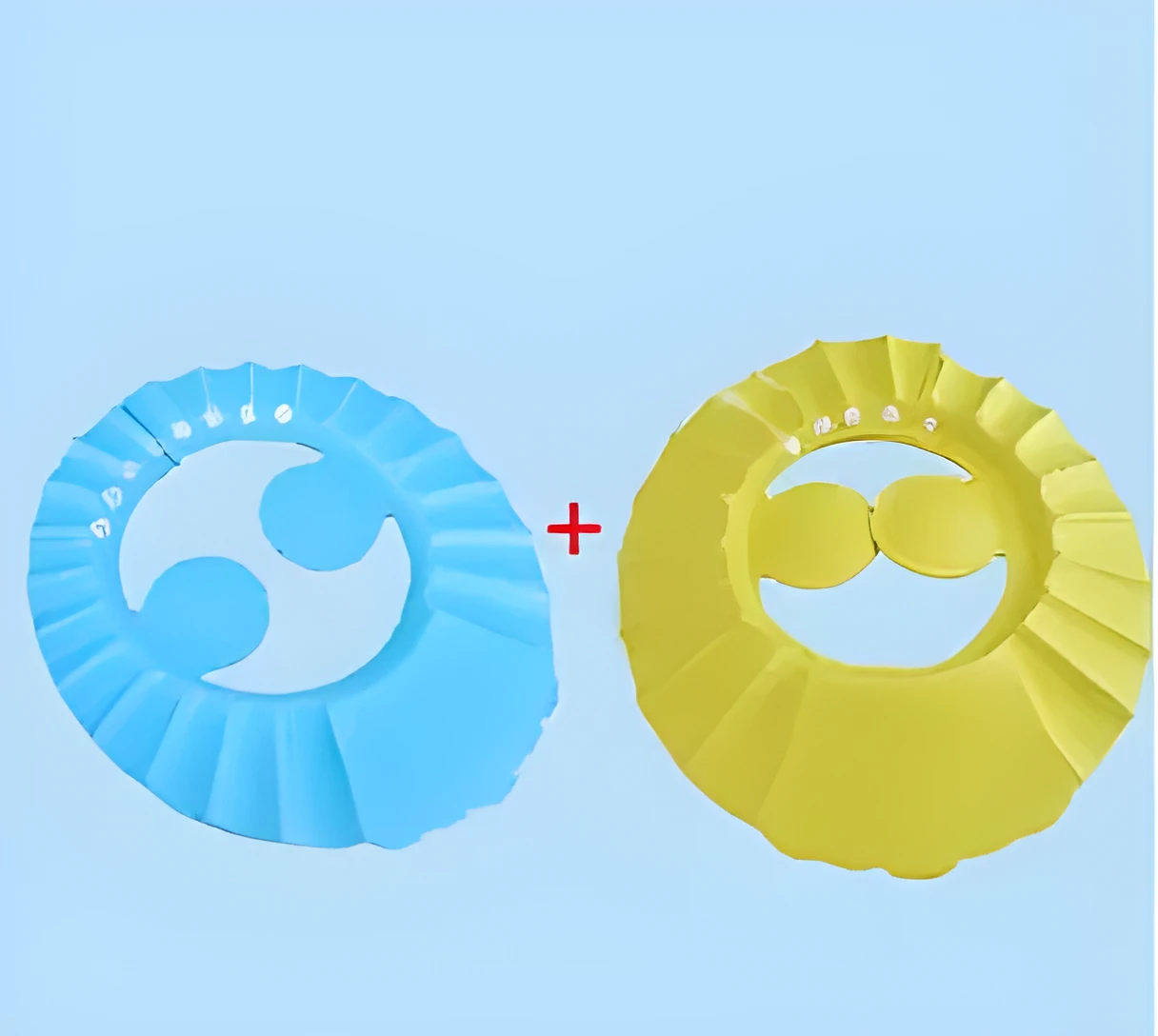 Blue baby shower cap with cartoon ear protection on a toddler's head during bath time