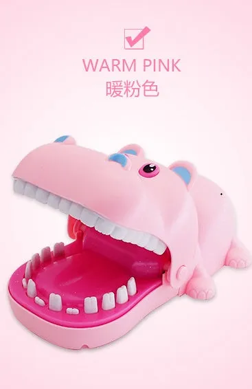 Multicoloured plastic bite hand animal interactive toy showing dog, crocodile, shark, and hippo designs