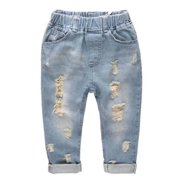 Light blue children's cotton skinny slim jeans laid flat showing slim leg and regular waist