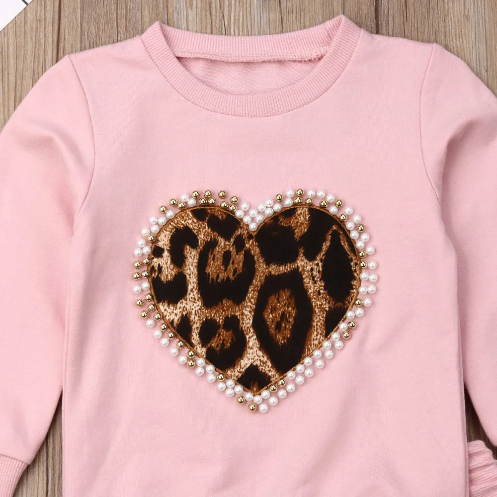 Children's pink cotton print sweatshirt and trousers two-piece set on white background