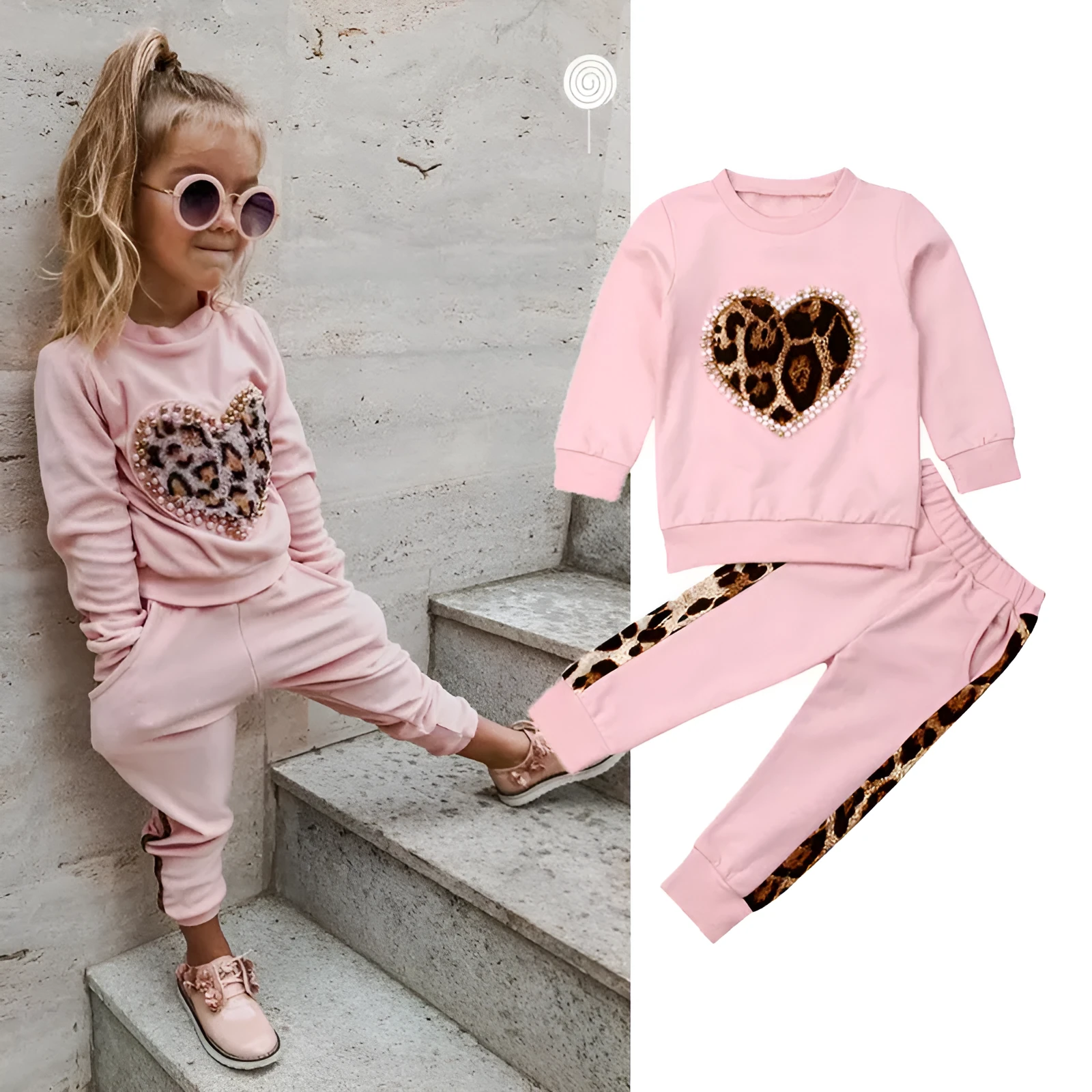 Children's pink cotton print sweatshirt and trousers two-piece set on white background