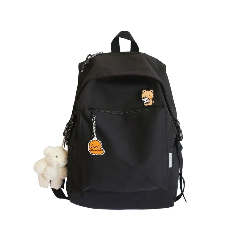 Korean style college backpack 20-35L water repellent in pink, front view