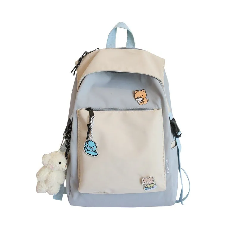 Korean style college backpack 20-35L water repellent in pink, front view