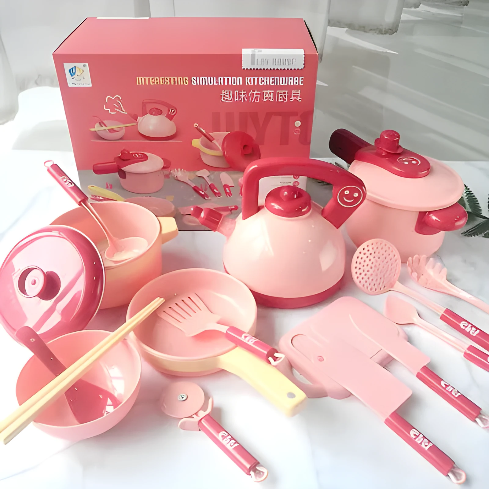 16-piece pink simulation kitchen toy set with electric rice cooker and microwave on a table
