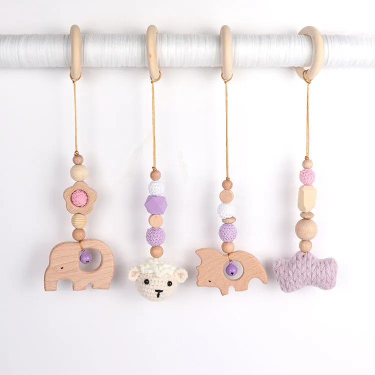 Beech wood baby rattle toy with animal decoration, 28cm long, available in six colours