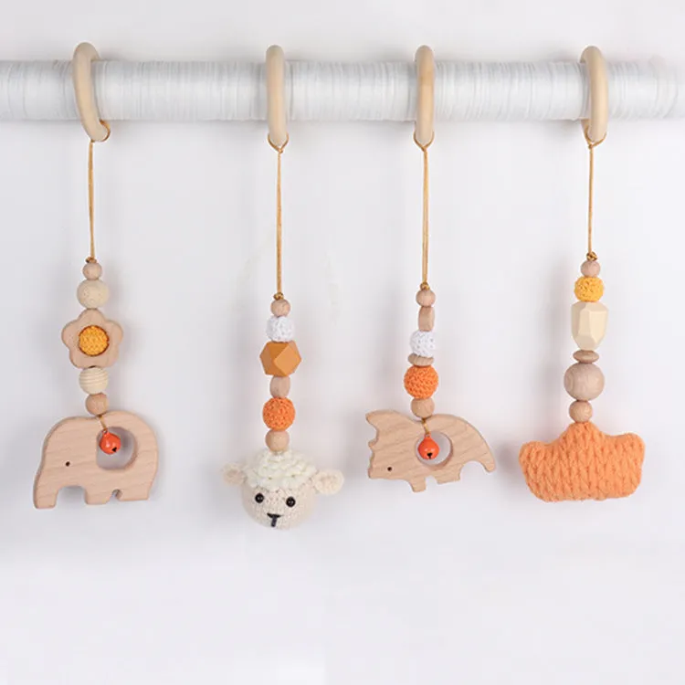 Beech wood baby rattle toy with animal decoration, 28cm long, available in six colours