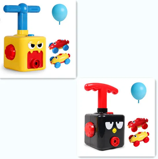 Balloon launch tower toy car with inflated balloon on a white surface