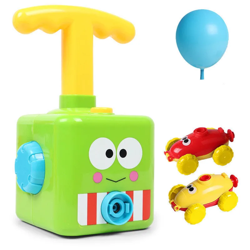 Balloon launch tower toy car with inflated balloon on a white surface