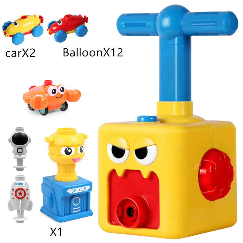 Balloon launch tower toy car with inflated balloon on a white surface