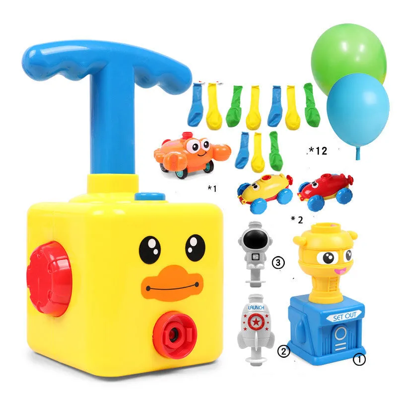 Balloon launch tower toy car with inflated balloon on a white surface