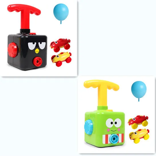 Balloon launch tower toy car with inflated balloon on a white surface