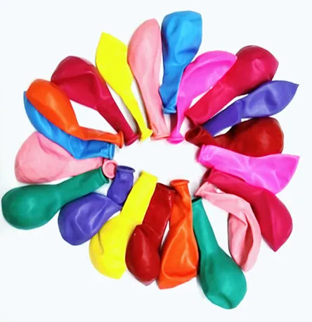 Balloon launch tower toy car with inflated balloon on a white surface