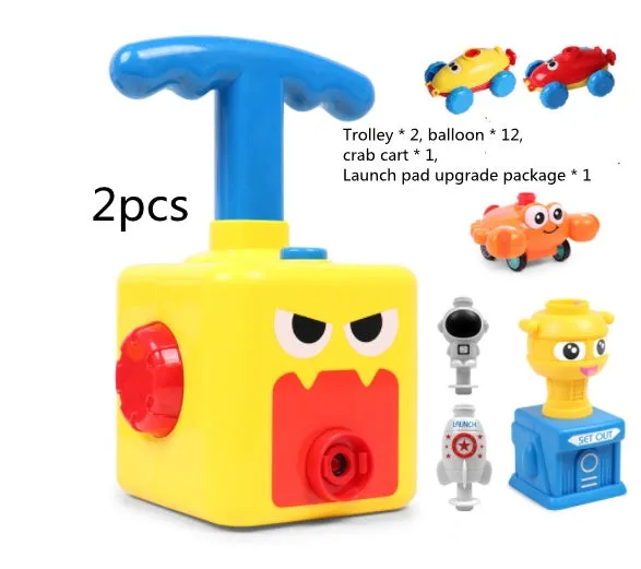 Balloon launch tower toy car with inflated balloon on a white surface