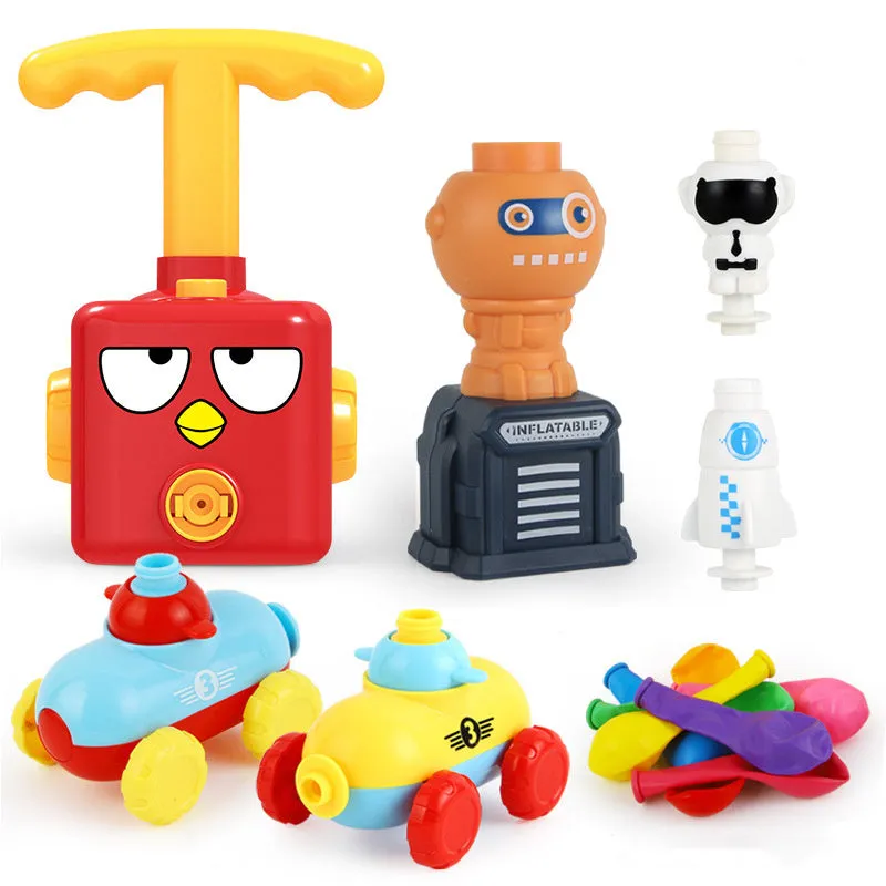 Balloon launch tower toy car with inflated balloon on a white surface