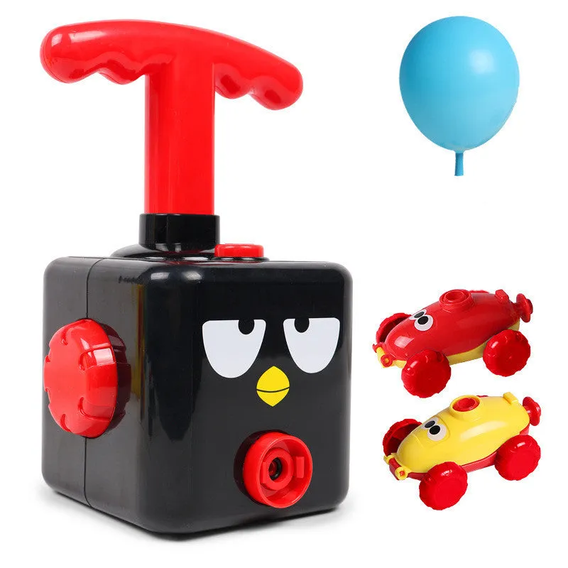 Balloon launch tower toy car with inflated balloon on a white surface