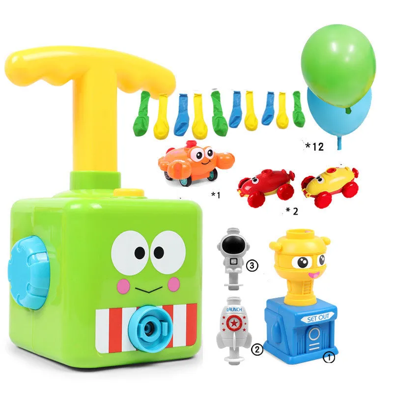 Balloon launch tower toy car with inflated balloon on a white surface