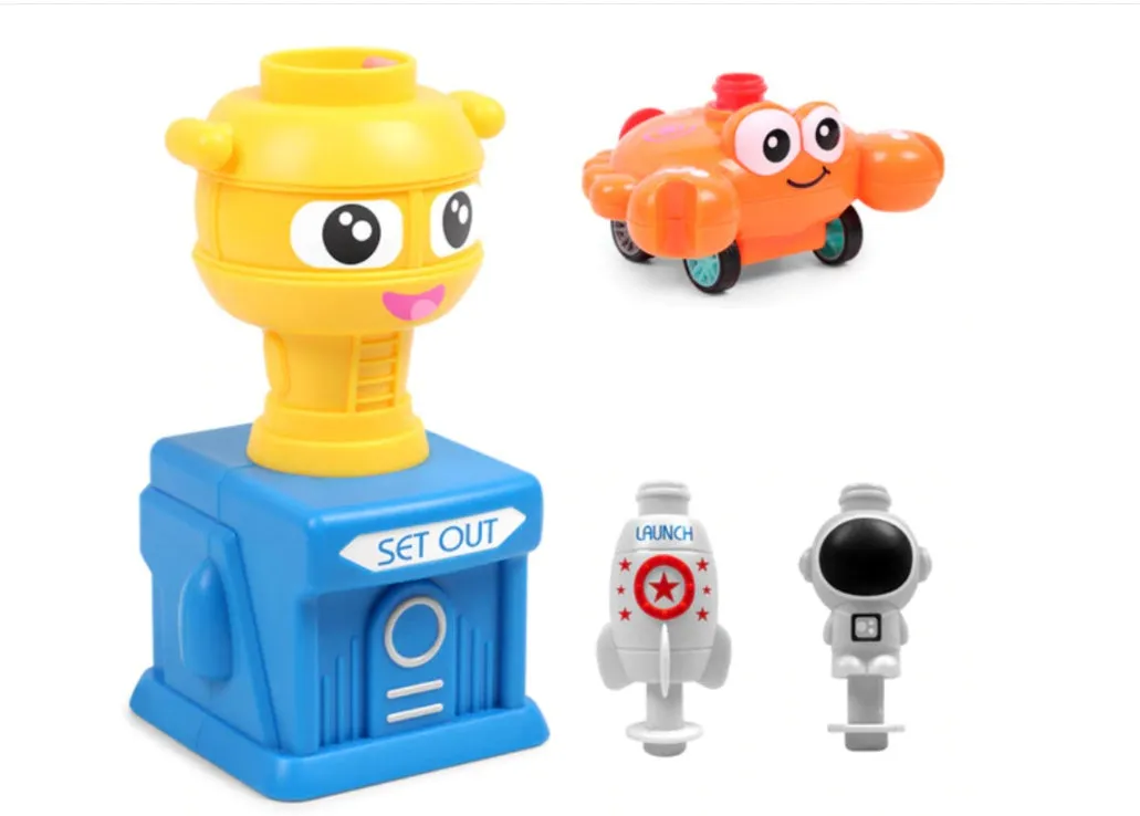 Balloon launch tower toy car with inflated balloon on a white surface