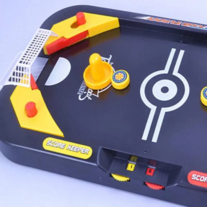 Desktop hockey table with goals, sticks, and balls for children's air hockey game