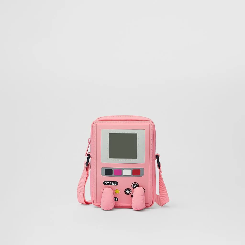 Small messenger bag in dark pink made from Oxford cloth with zipper closure and stitching detail