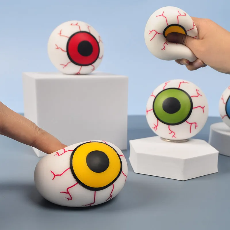 Flour eye ball stress toy made of TPR, 6cm diameter, random colour, on a plain background.