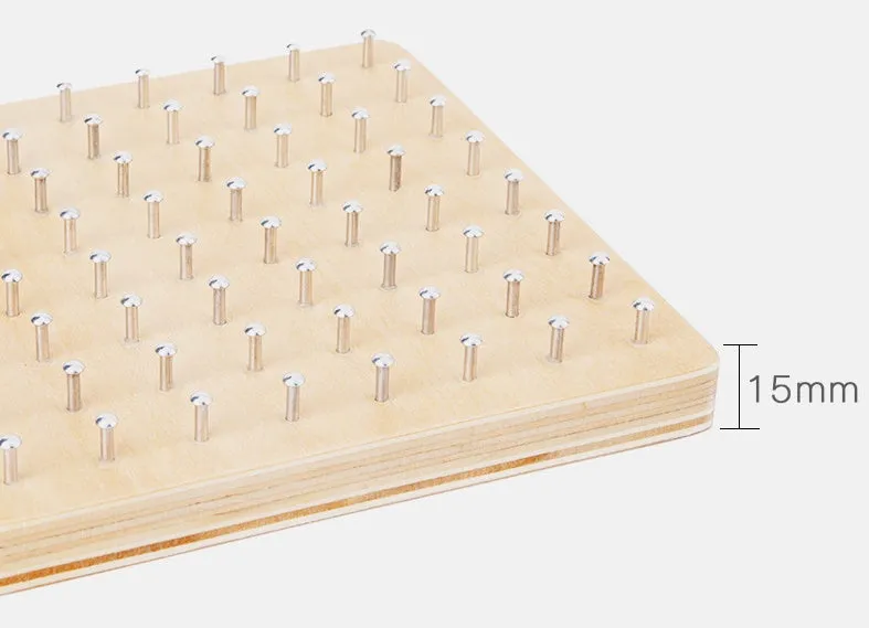 Yellow wooden Montessori nail plate 15x15x2cm on a flat surface