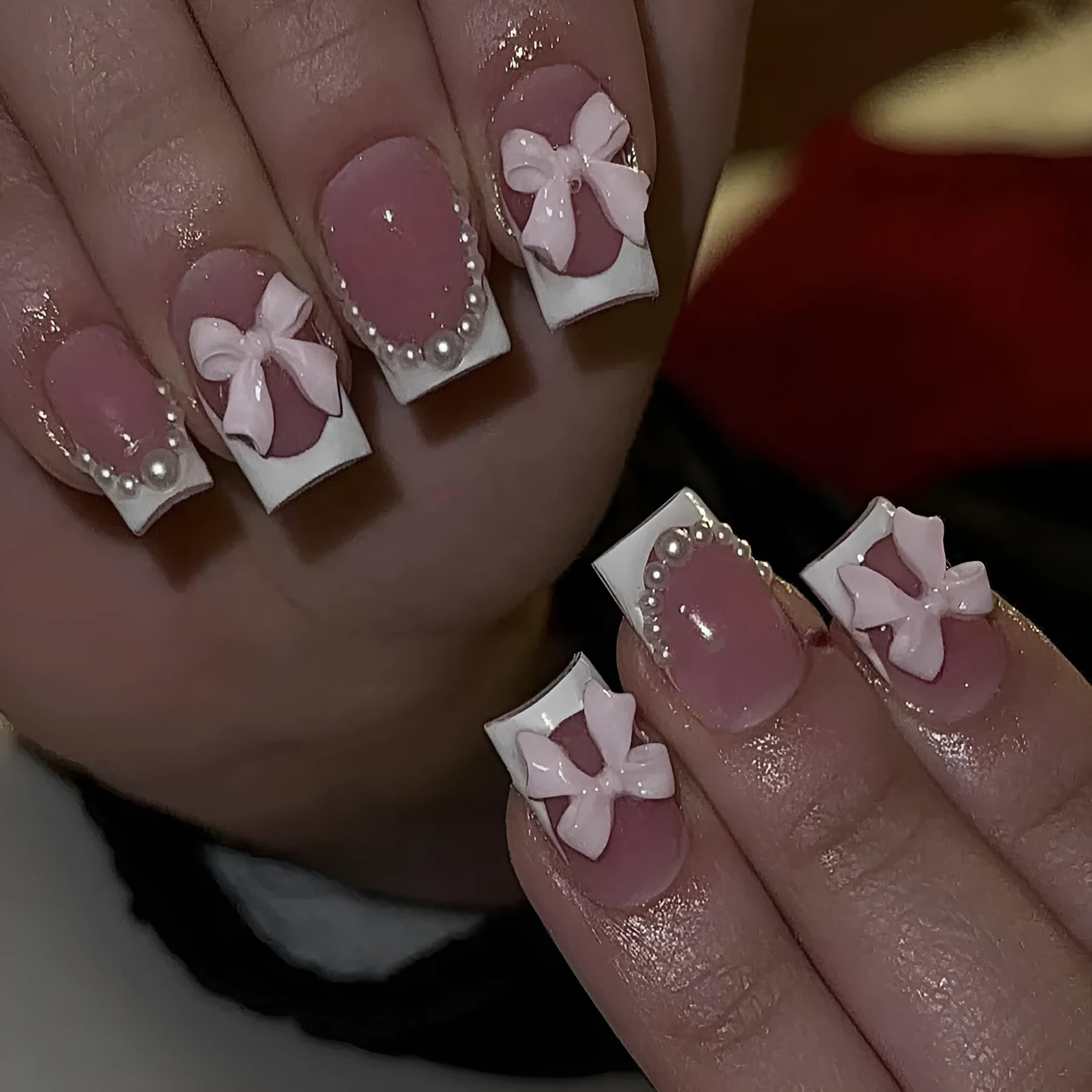 Set of 24 short French manicure false nails with white tips, bow designs, tulip patterns, and leopard print on a European square shape.