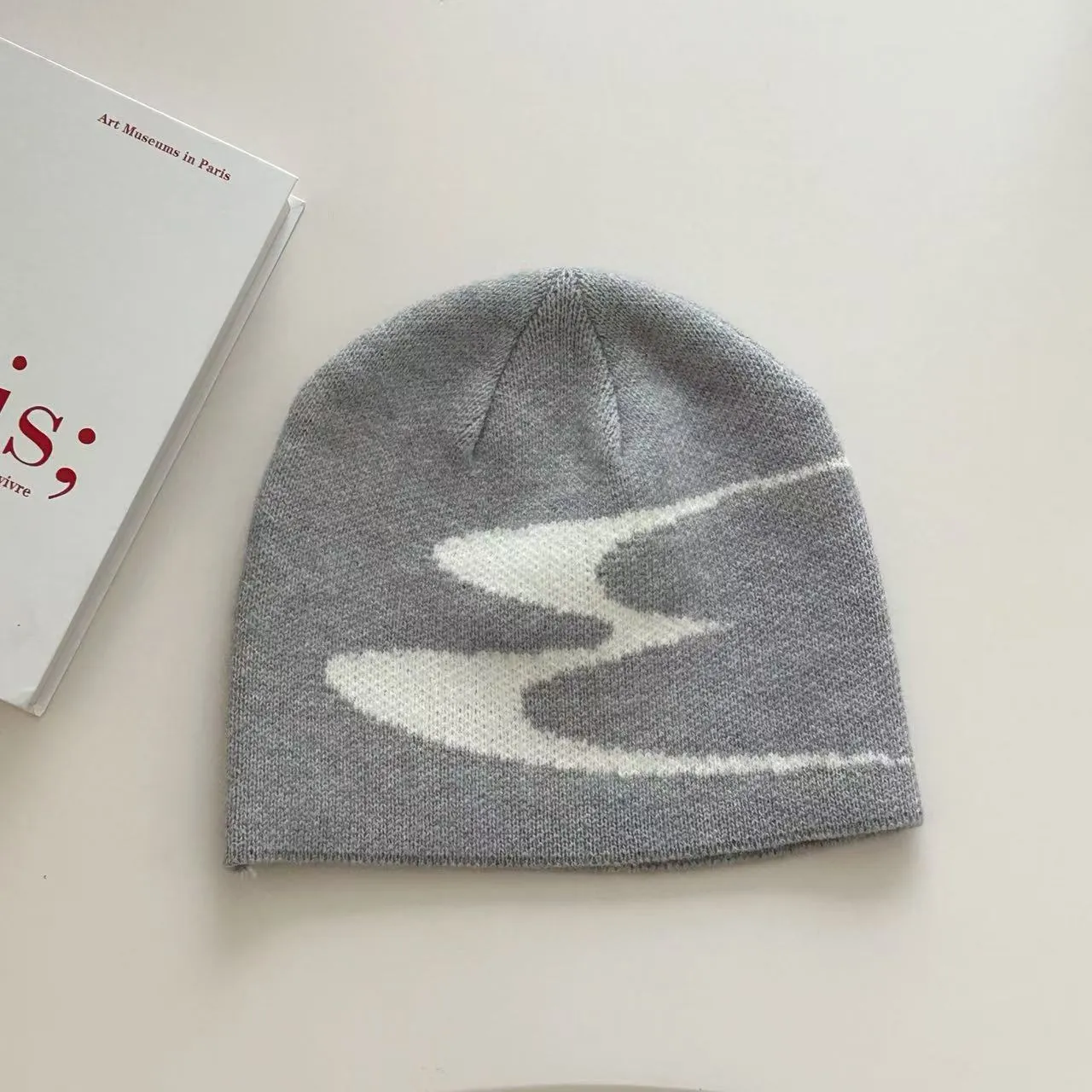 Acrylic knitted beanie hat in black, grey, or white for men and women with 56-58cm size