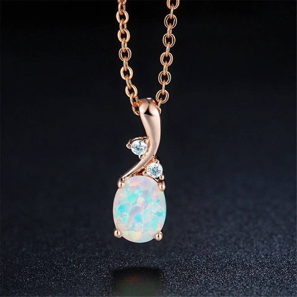 Water drop shaped opal pendant necklace on O-shaped chain in rose gold or white finish