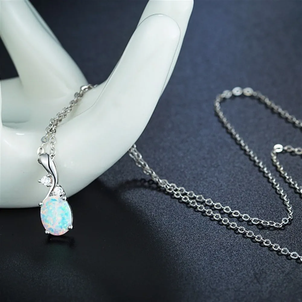 Water drop shaped opal pendant necklace on O-shaped chain in rose gold or white finish