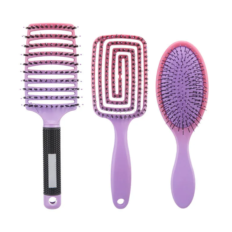 Gradient curly hair hollow comb set with three combs in orange and yellow gradient on a light background
