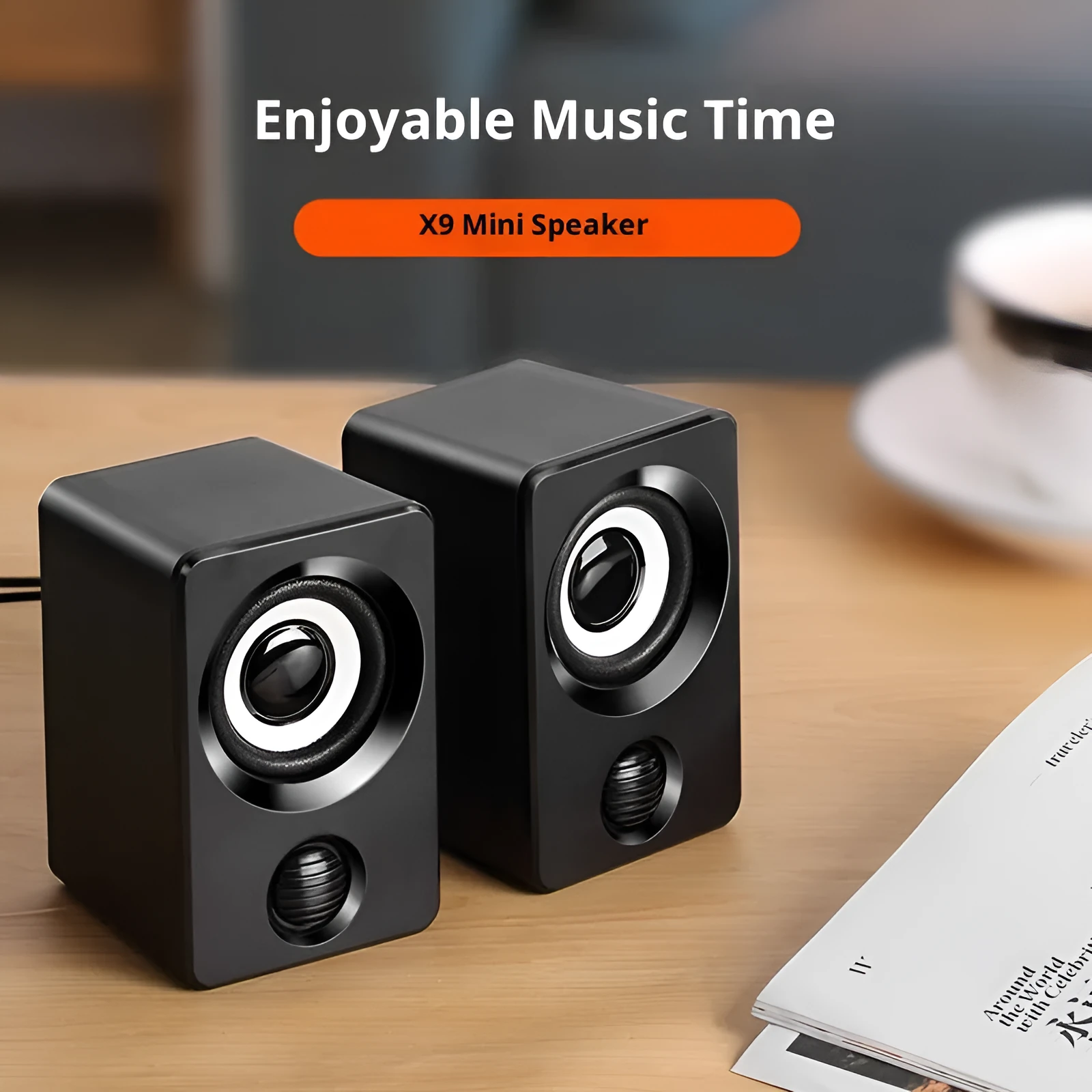 A pair of black plastic USB mini multimedia speakers with wired connection