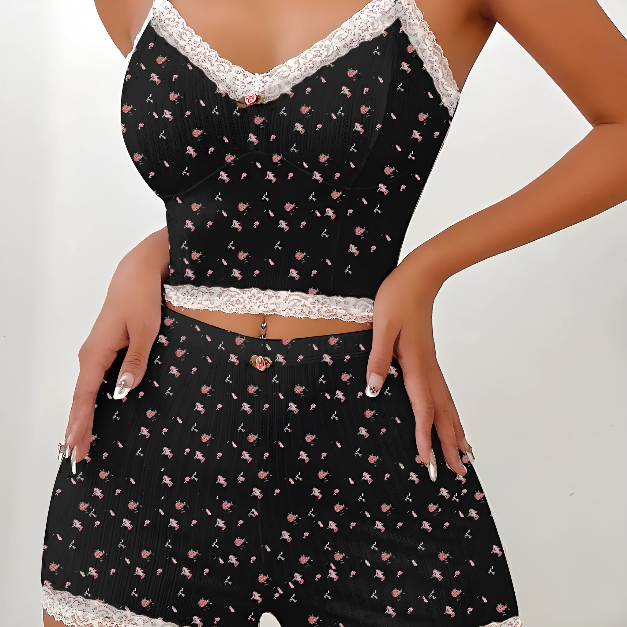 Design Sense ladies home leisure suit two-piece set with sleeveless top and shorts in white background floral pattern