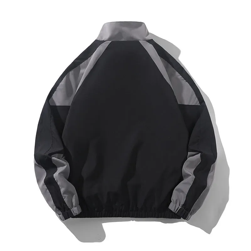 Men's black casual jacket with contrast stitching and side seam pockets, shown on a model.