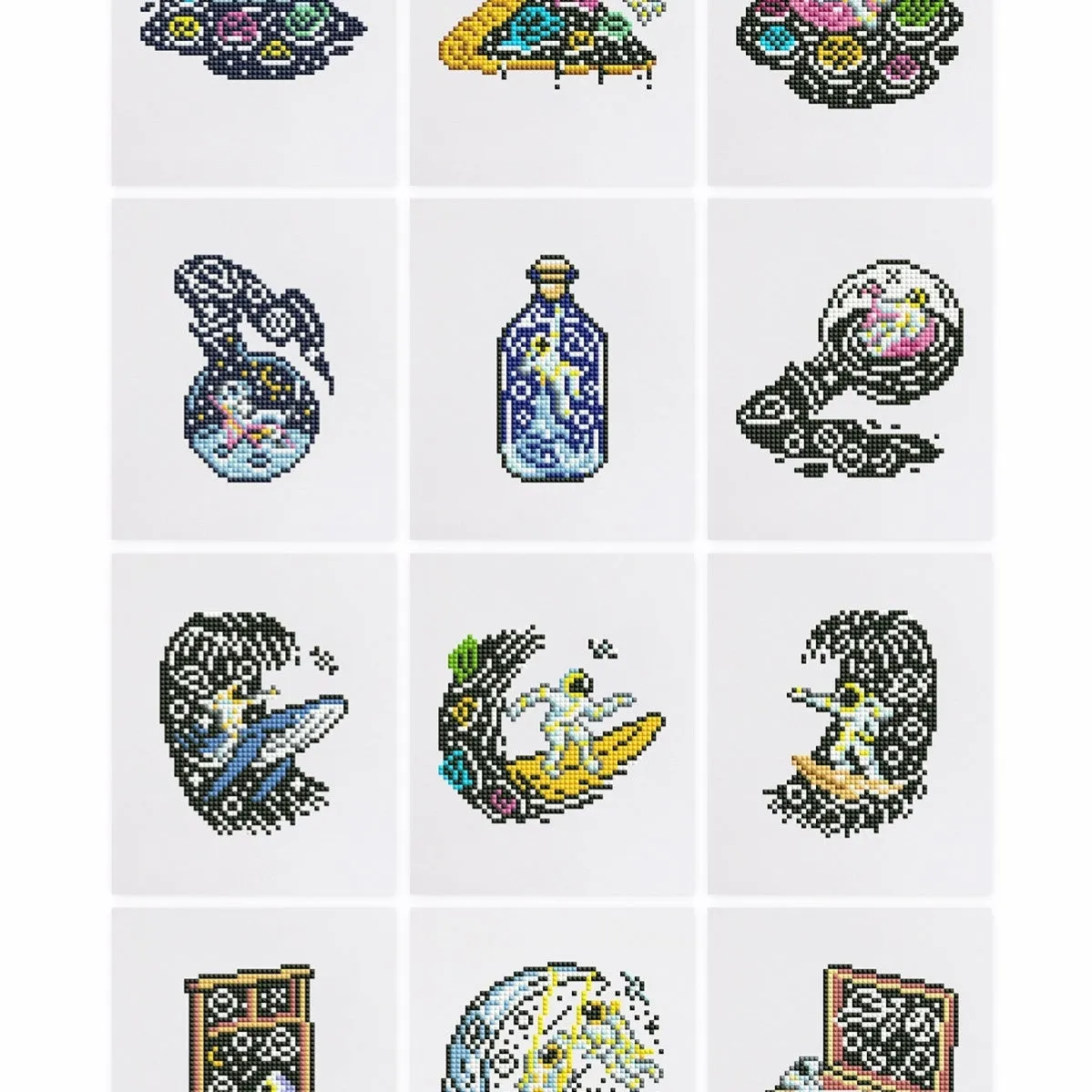 Diamond painting kit set with 12 non-repeating frameless acrylic cartoon designs on white background