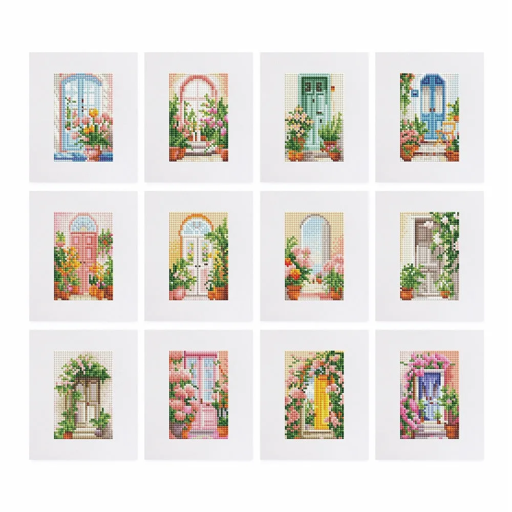 Diamond painting kit set with 12 non-repeating frameless acrylic cartoon designs on white background