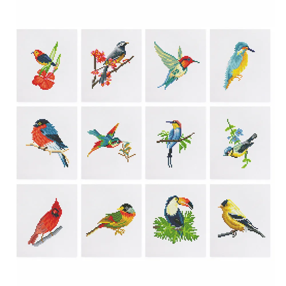 Diamond painting kit set with 12 non-repeating frameless acrylic cartoon designs on white background