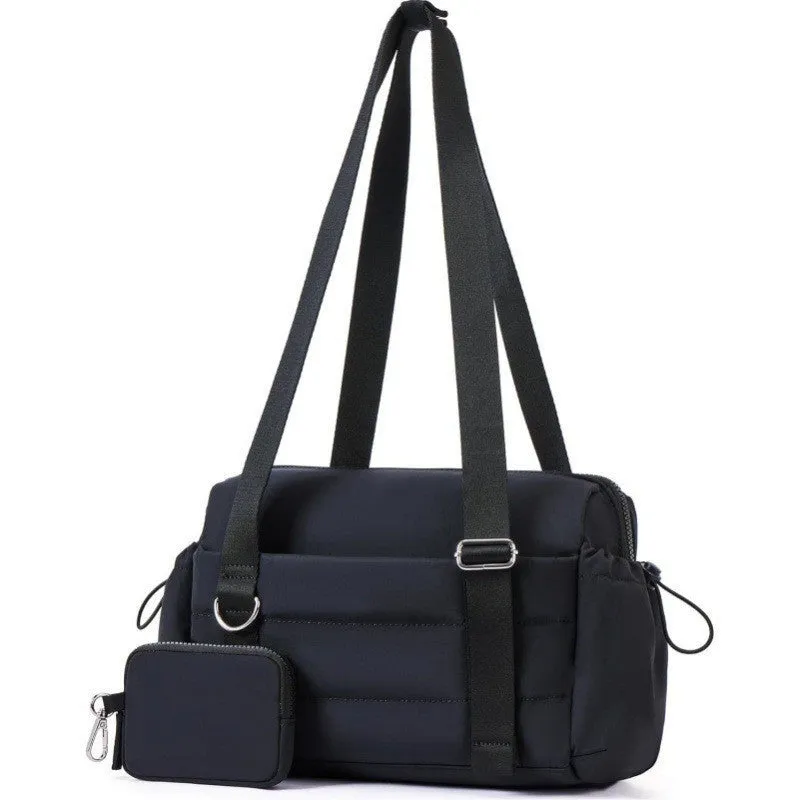 Women's black nylon shoulder gym bag with chain detail, 36-55L capacity, on plain background