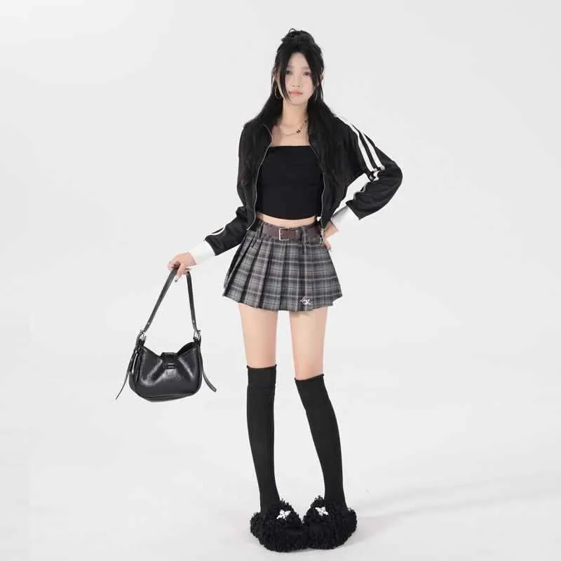 High-waist American retro A-line pleated skirt in black plaid pure cotton spandex blend, front view