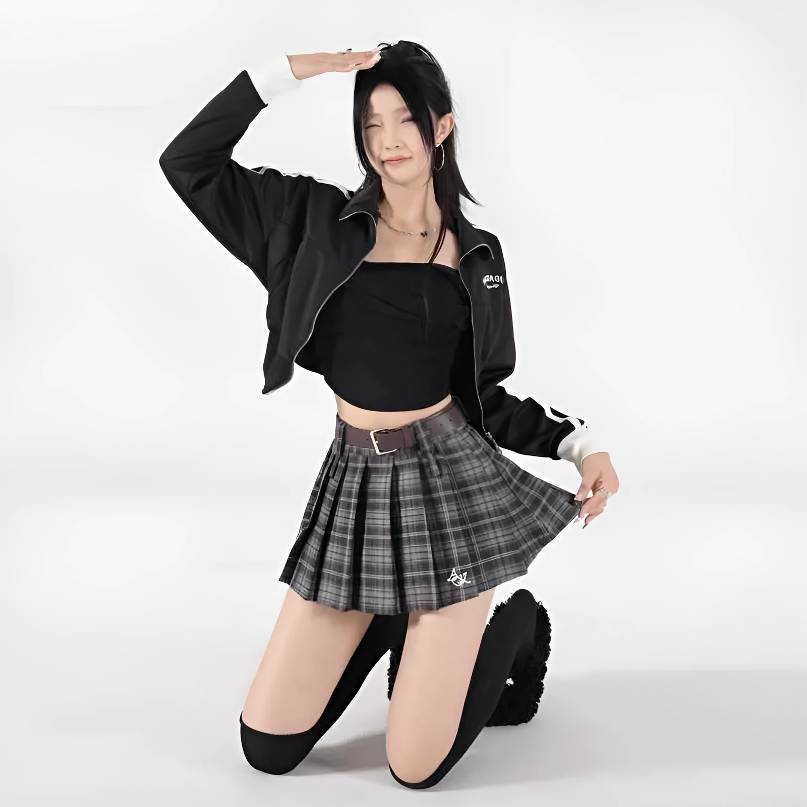 High-waist American retro A-line pleated skirt in black plaid pure cotton spandex blend, front view