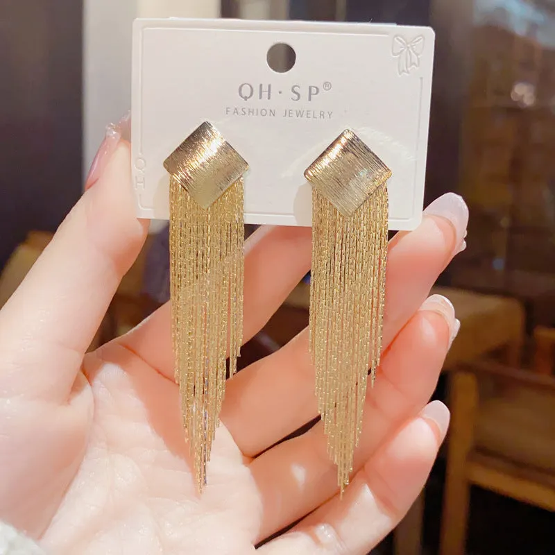 Pair of geometric tassel earrings with electroplated copper finish and real gold colour retention, simple style for women