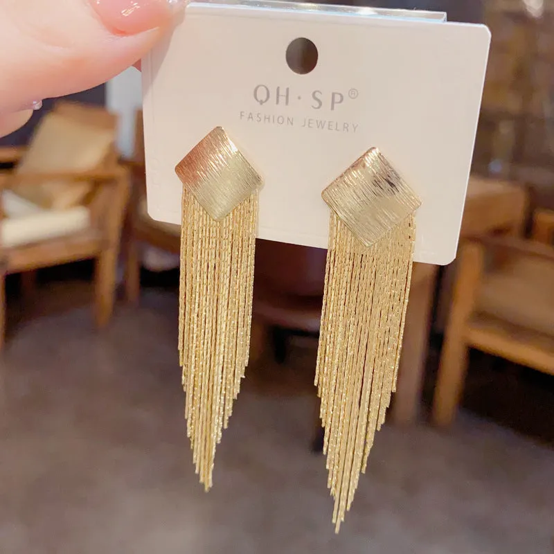 Pair of geometric tassel earrings with electroplated copper finish and real gold colour retention, simple style for women
