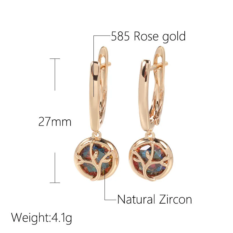Rose gold plated copper drop earrings with artificial gemstone inlay on white background