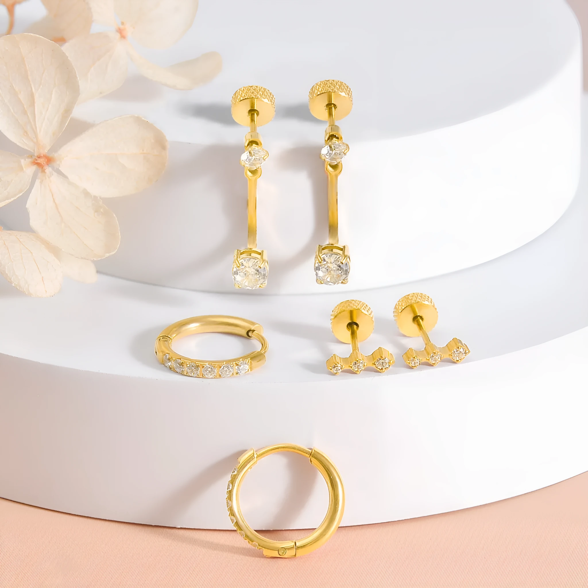Set of three pairs titanium steel ring-shaped earrings with zircon inlay, steel colour finish