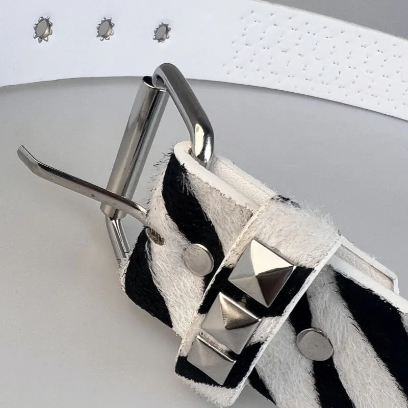 Women's punk style belt with decorative metal rivets on PU leather in animal print pattern with alloy buckle