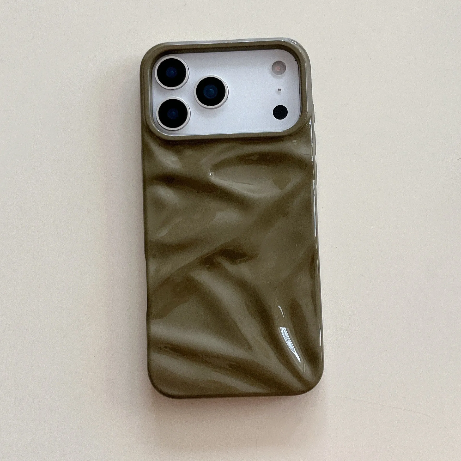 QF pleated TPU phone case in green for iPhone 15 Pro with three-dimensional textured pattern